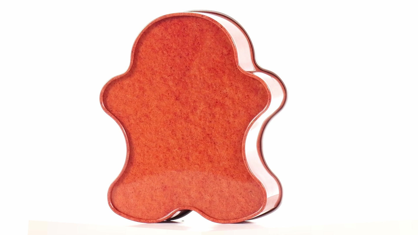 Cute metal figure shaped like a gingerbread man