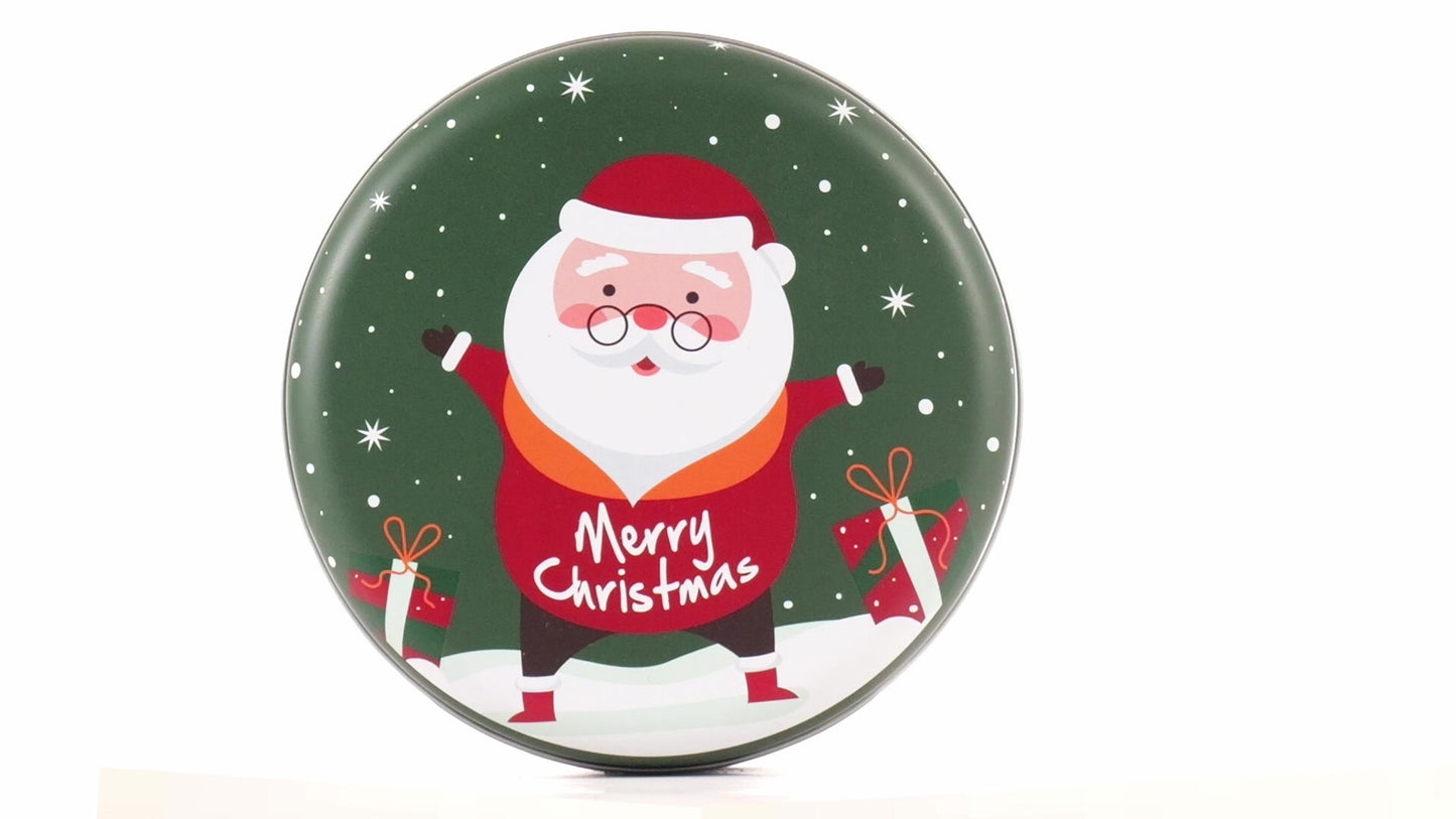 Round green metal tin with Santa Claus design