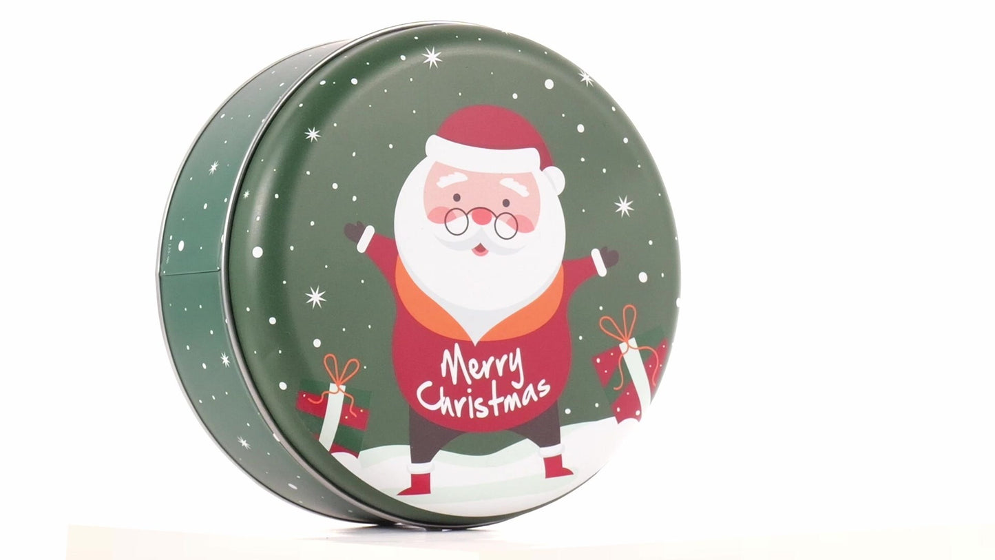 Round green metal tin with Santa Claus design