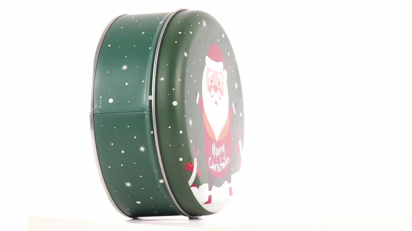 Round green metal tin with Santa Claus design