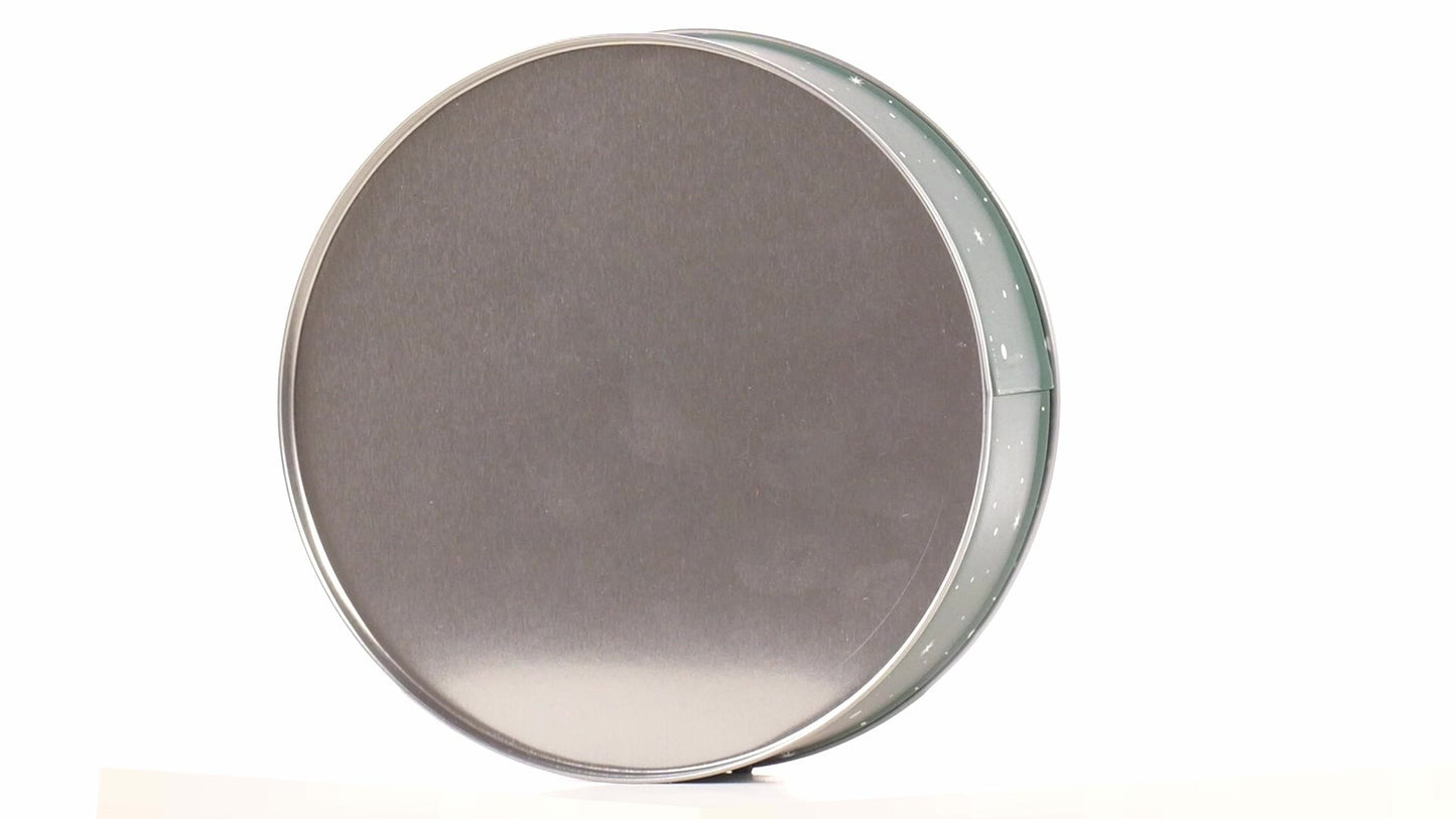 Round green metal tin with Santa Claus design