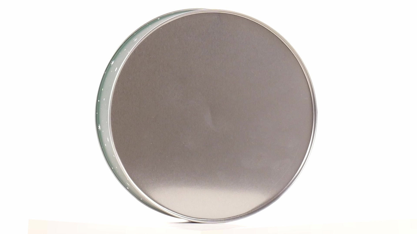 Round green metal tin with Santa Claus design