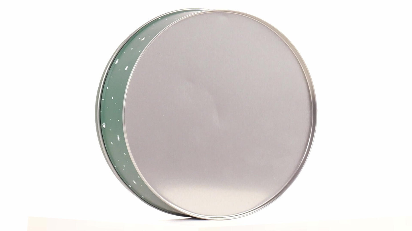 Round green metal tin with Santa Claus design
