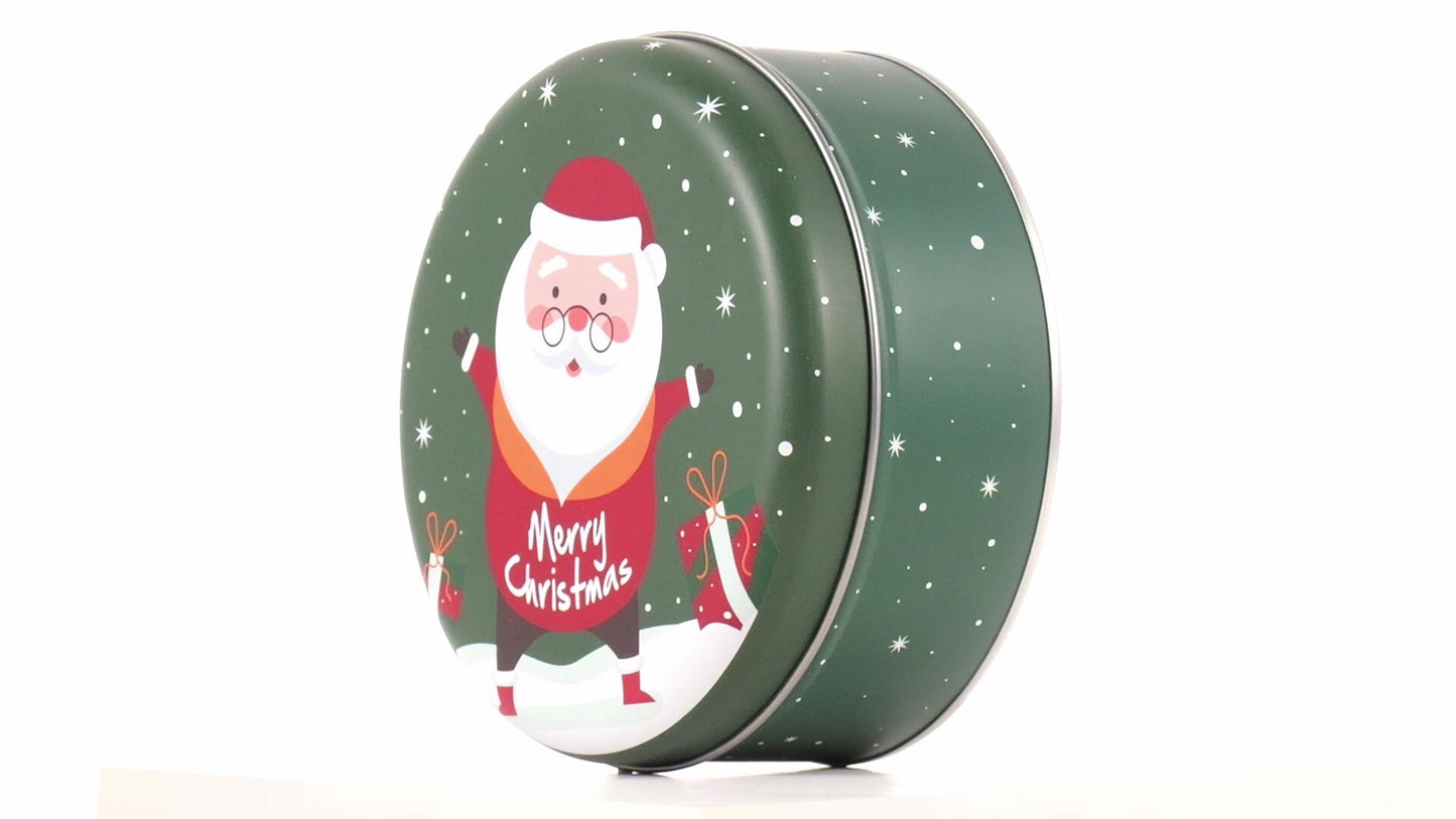 Round green metal tin with Santa Claus design