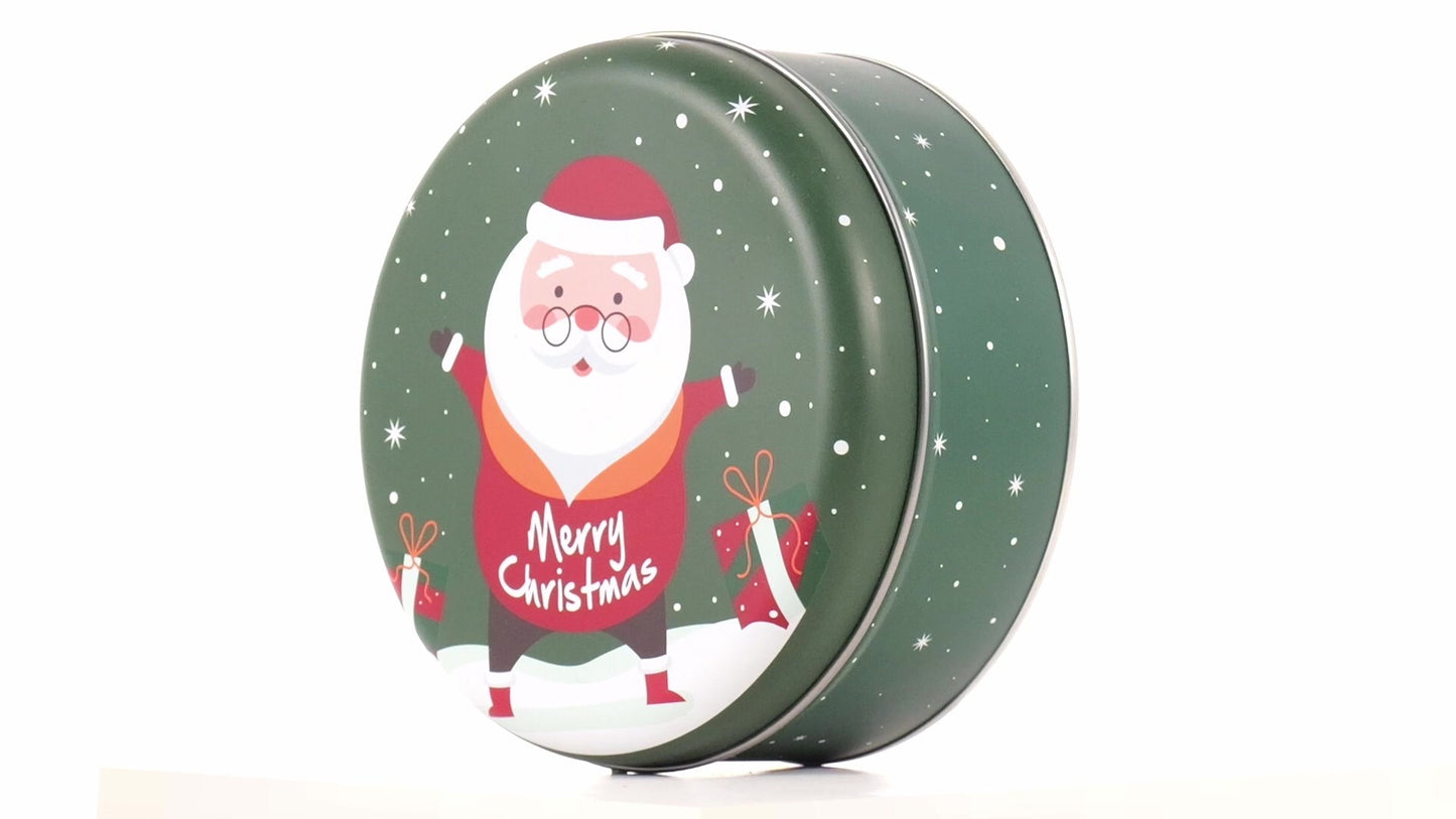 Round green metal tin with Santa Claus design