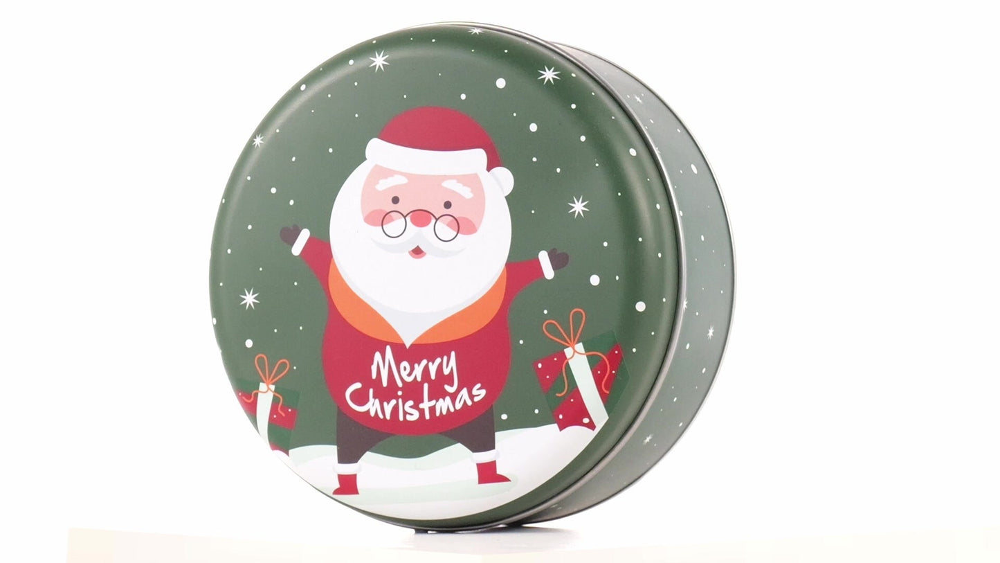 Round green metal tin with Santa Claus design