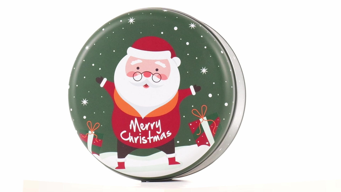 Round green metal tin with Santa Claus design