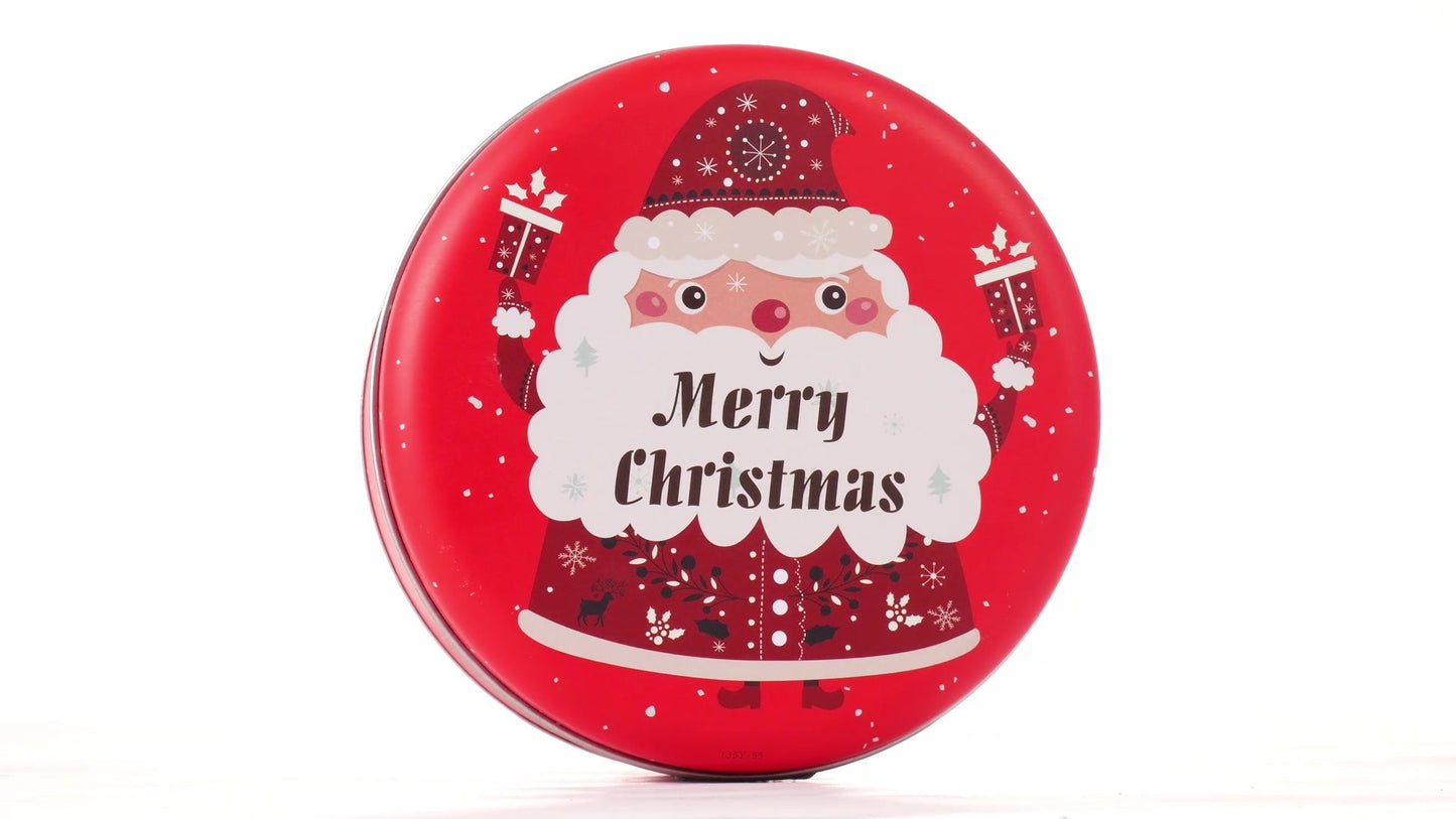 Round red metal tin with Santa Claus design