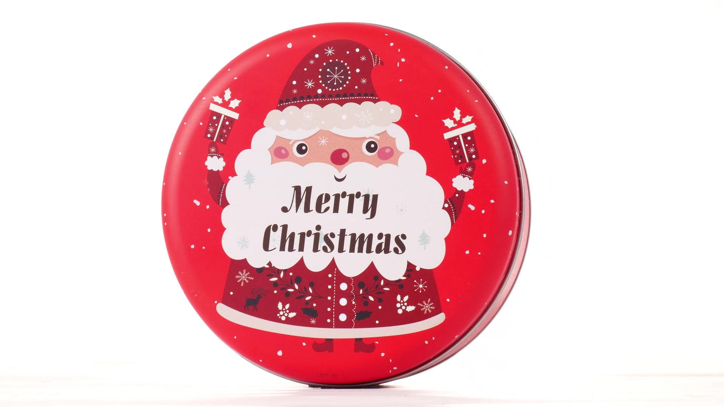 Round red metal tin with Santa Claus design