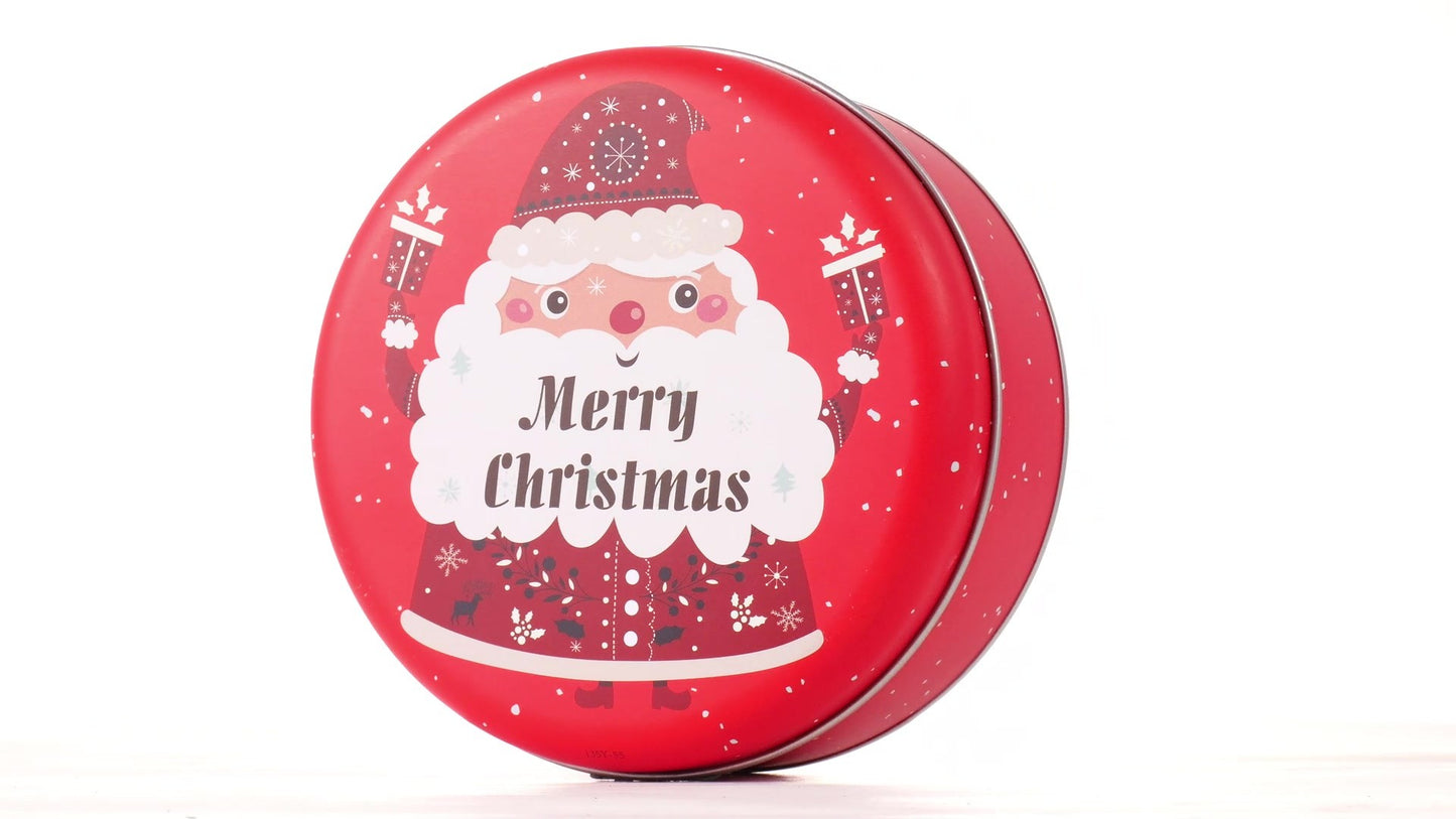 Round red metal tin with Santa Claus design