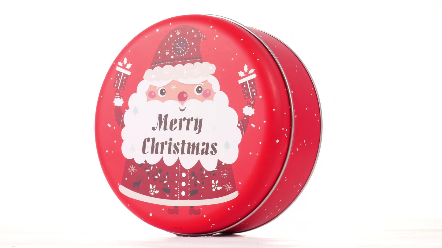 Round red metal tin with Santa Claus design
