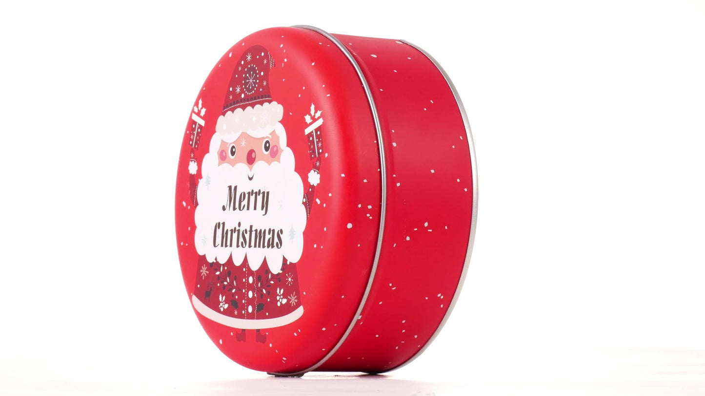 Round red metal tin with Santa Claus design