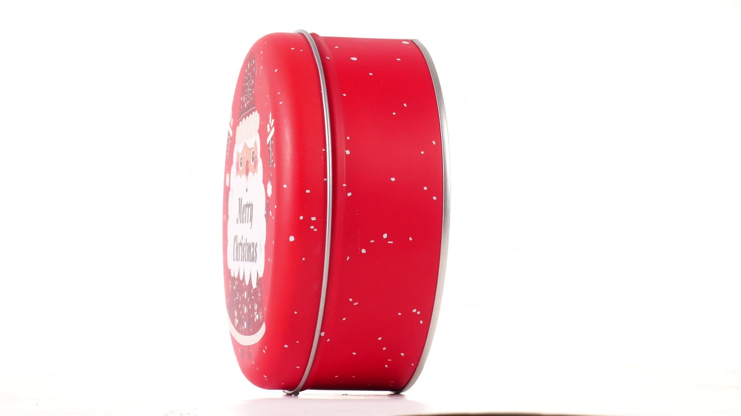 Round red metal tin with Santa Claus design