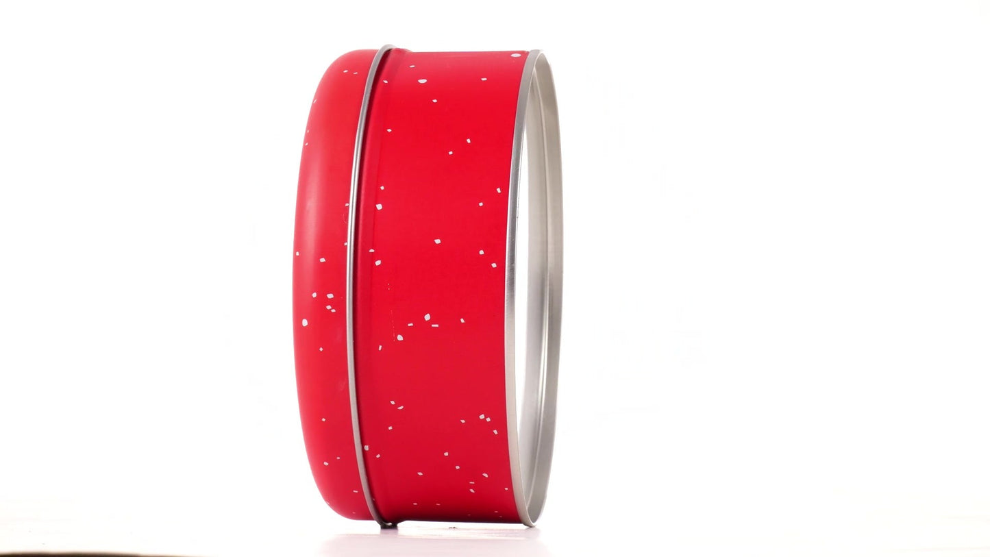 Round red metal tin with Santa Claus design