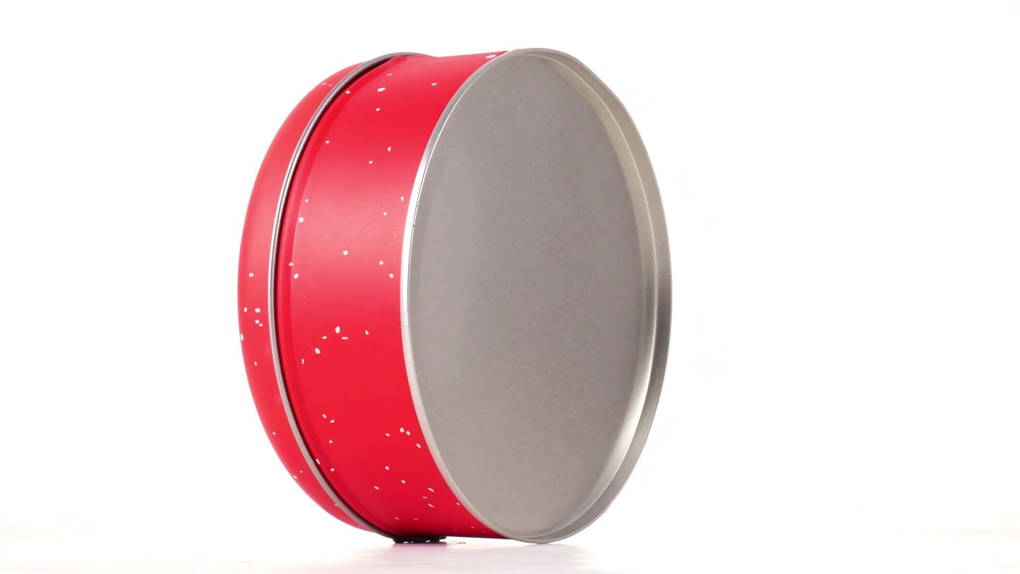 Round red metal tin with Santa Claus design