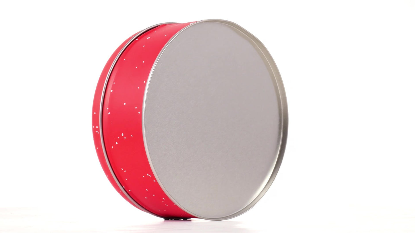 Round red metal tin with Santa Claus design