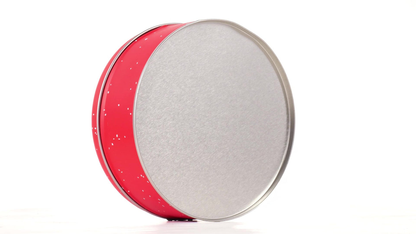 Round red metal tin with Santa Claus design