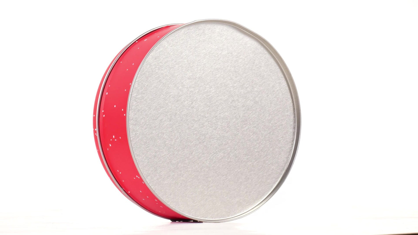 Round red metal tin with Santa Claus design