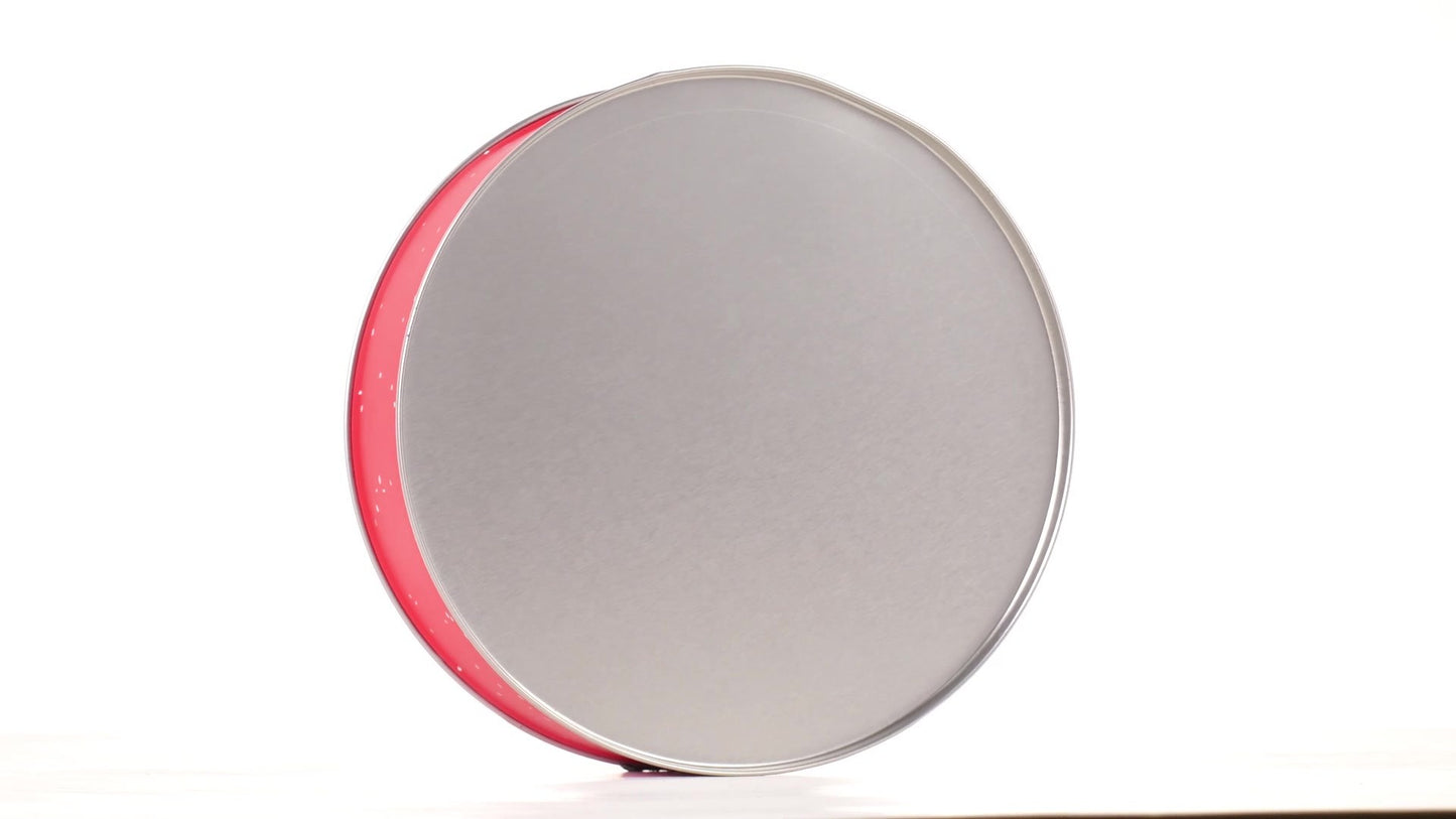 Round red metal tin with Santa Claus design