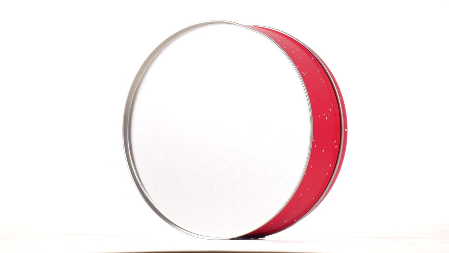 Round red metal tin with Santa Claus design