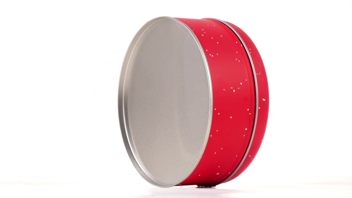 Round red metal tin with Santa Claus design
