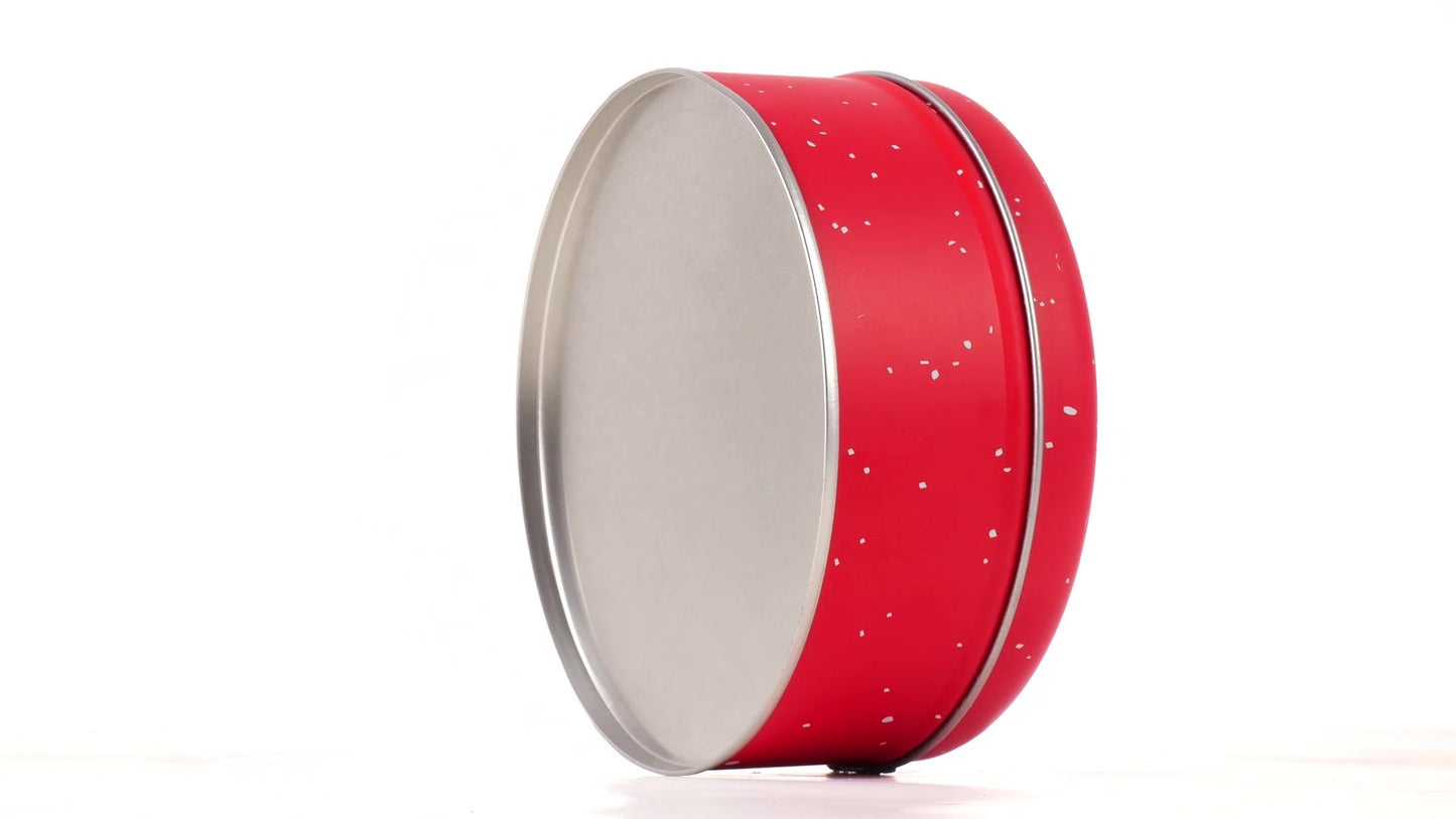 Round red metal tin with Santa Claus design