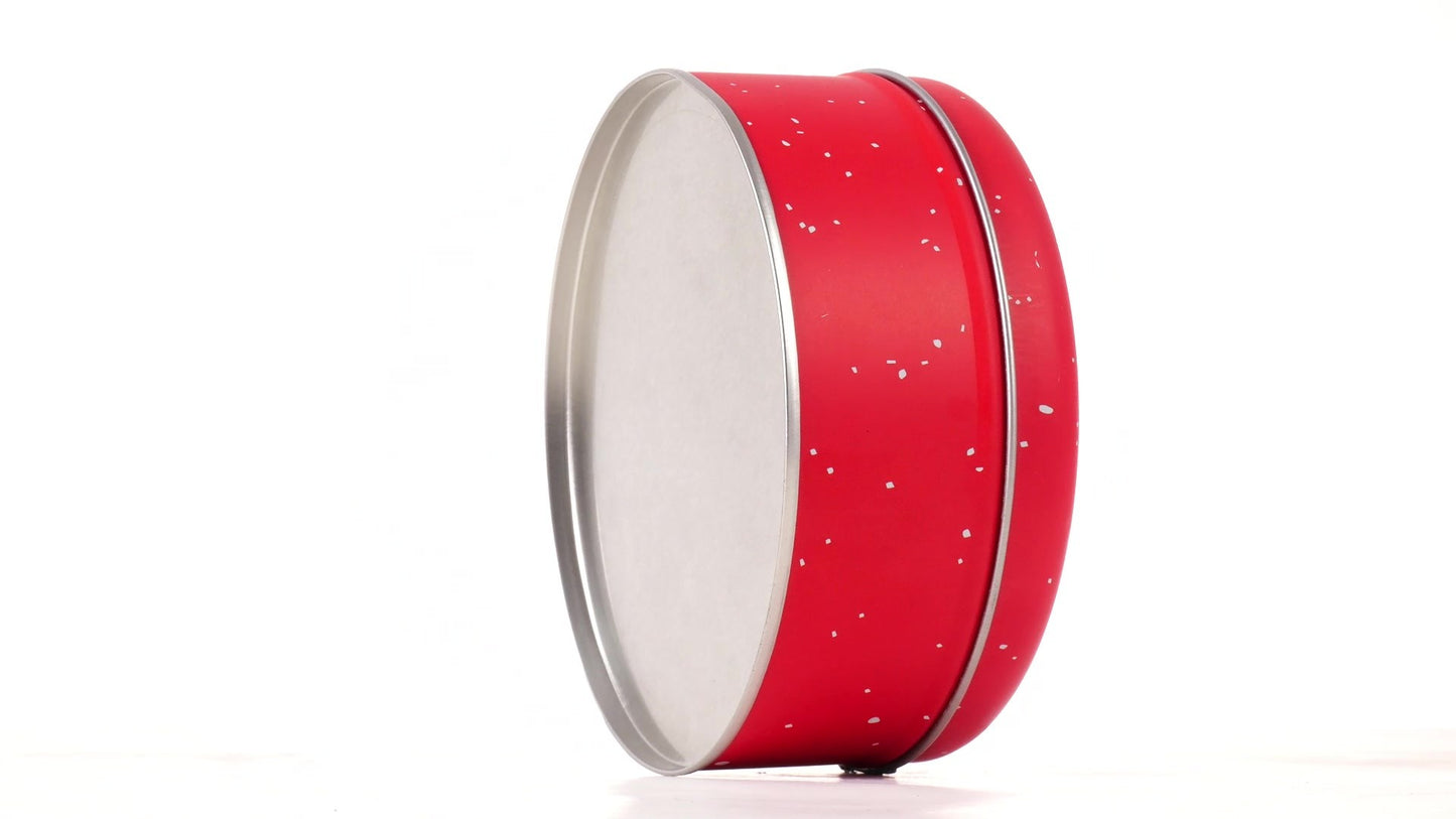 Round red metal tin with Santa Claus design
