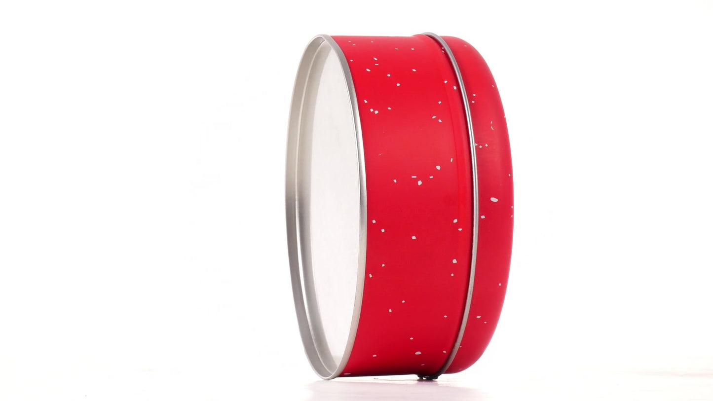 Round red metal tin with Santa Claus design