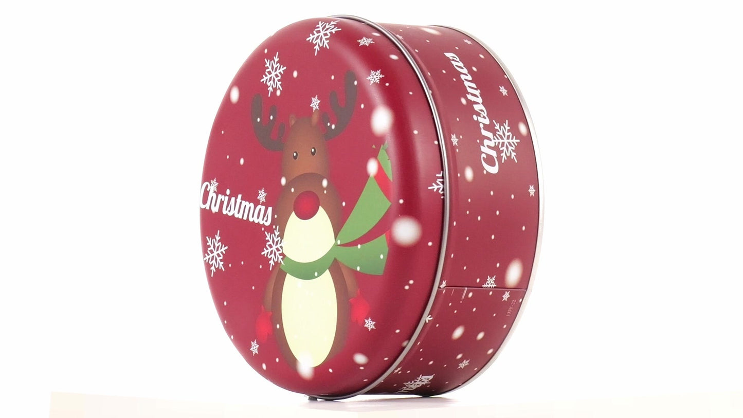 Round red metal tin with Christmas reindeer pattern