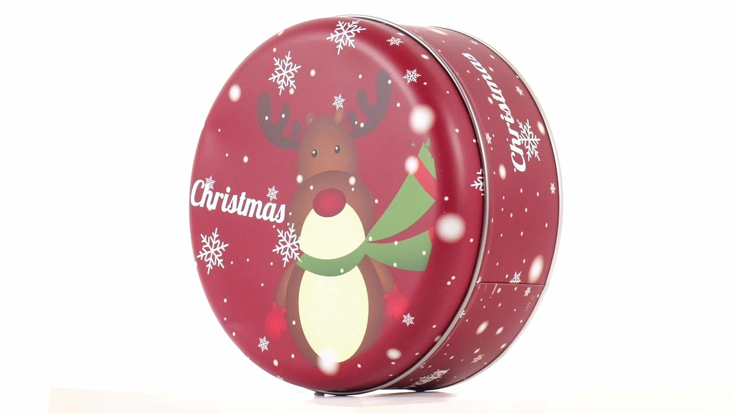 Round red metal tin with Christmas reindeer pattern