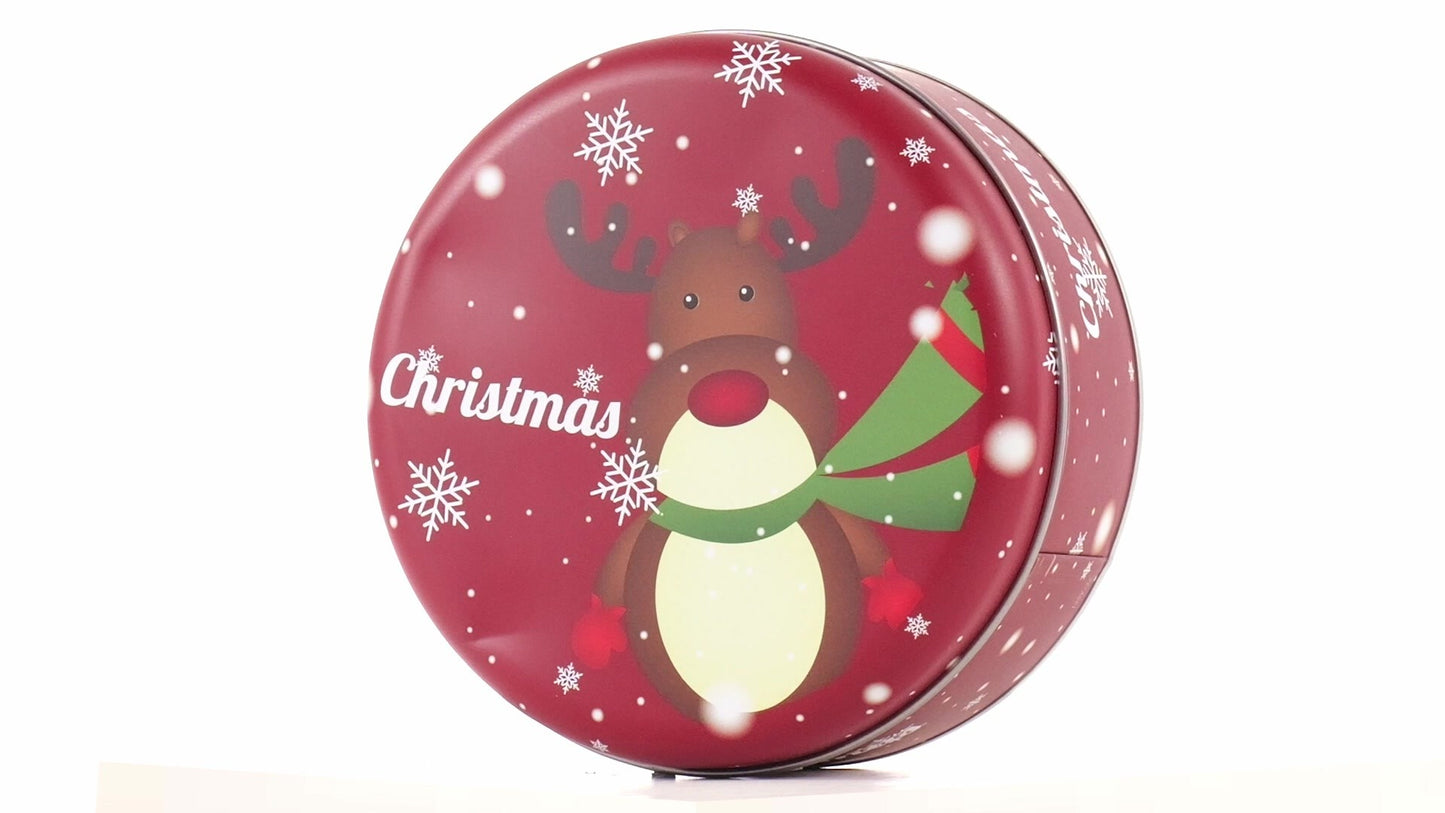 Round red metal tin with Christmas reindeer pattern