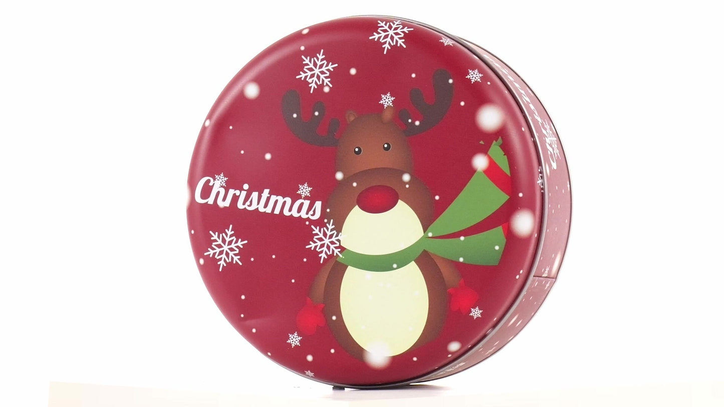 Round red metal tin with Christmas reindeer pattern