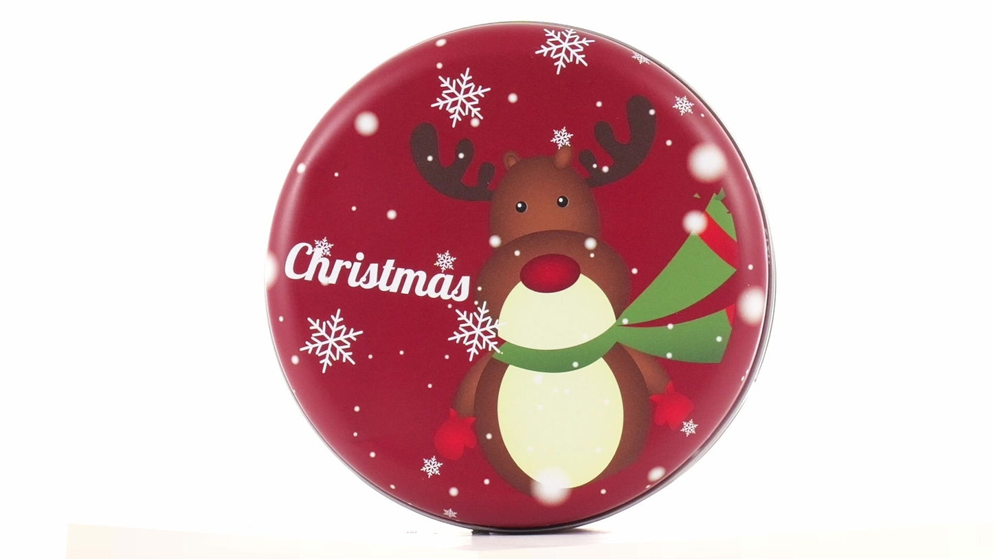 Round red metal tin with Christmas reindeer pattern