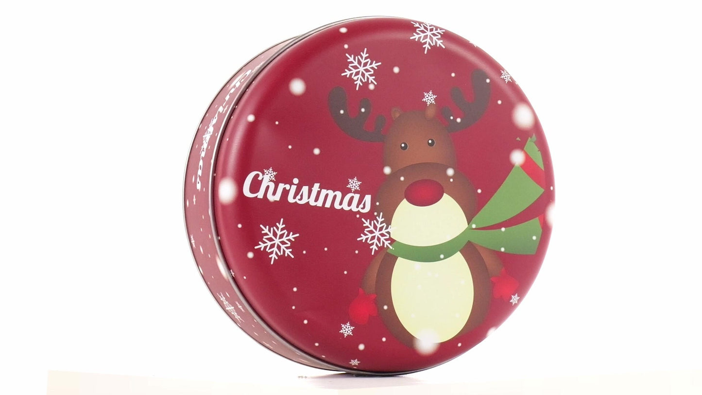 Round red metal tin with Christmas reindeer pattern