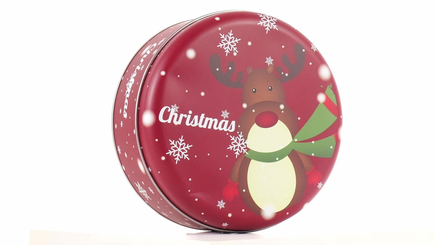 Round red metal tin with Christmas reindeer pattern