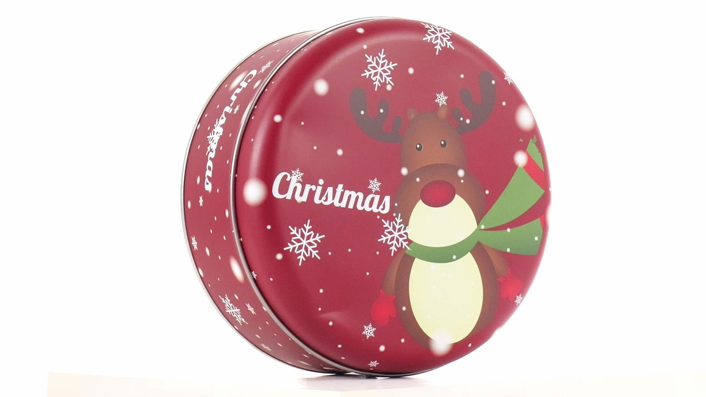 Round red metal tin with Christmas reindeer pattern