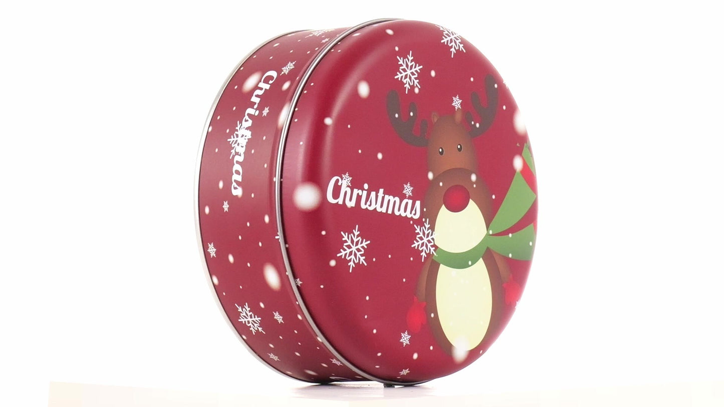 Round red metal tin with Christmas reindeer pattern