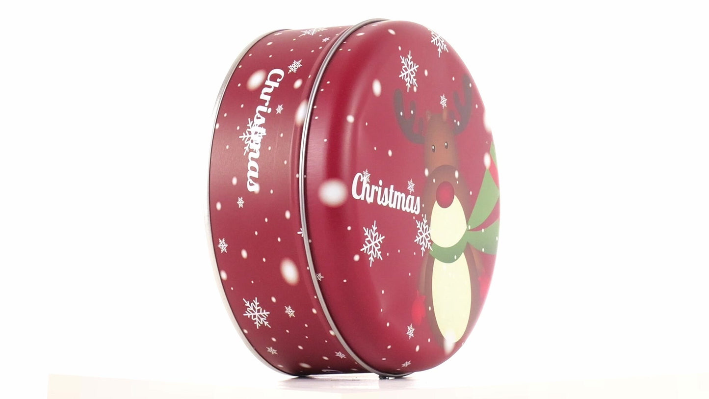 Round red metal tin with Christmas reindeer pattern
