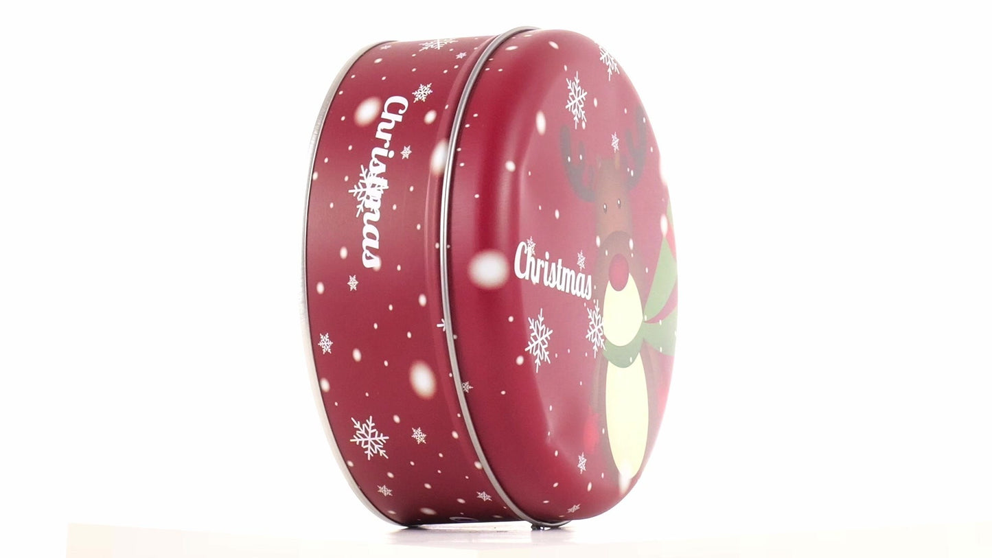 Round red metal tin with Christmas reindeer pattern