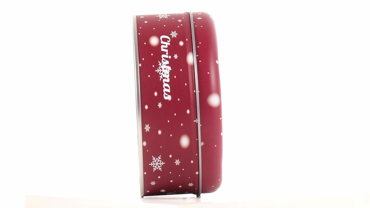 Round red metal tin with Christmas reindeer pattern
